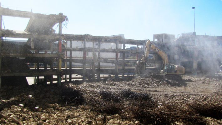 Demolition site with excavator downtown