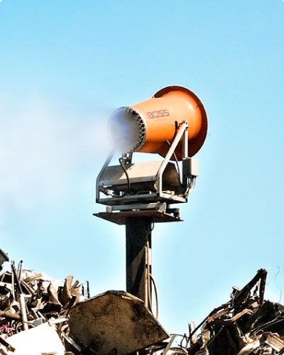 DB-60 Tower At Scrap Metal Recycling Facility Throwing Mist