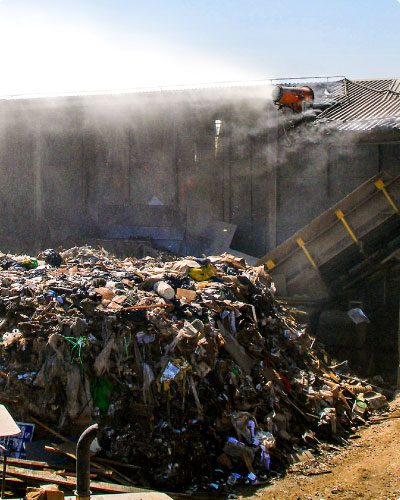 DustBoss dust control system at transfer station throwing mist