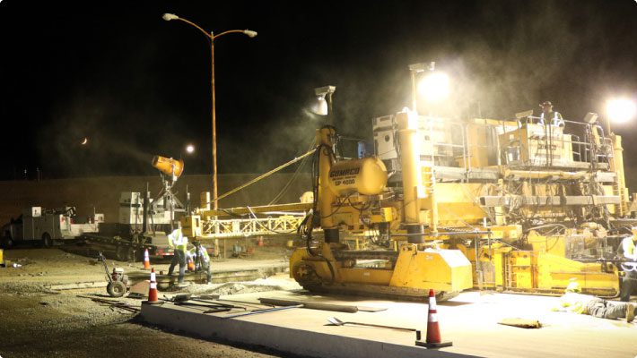 DustBoss dispersing mist at concrete curing site