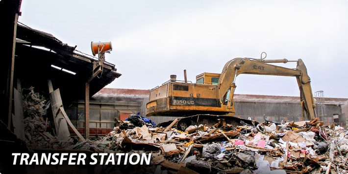 Dust control system at a transfer station