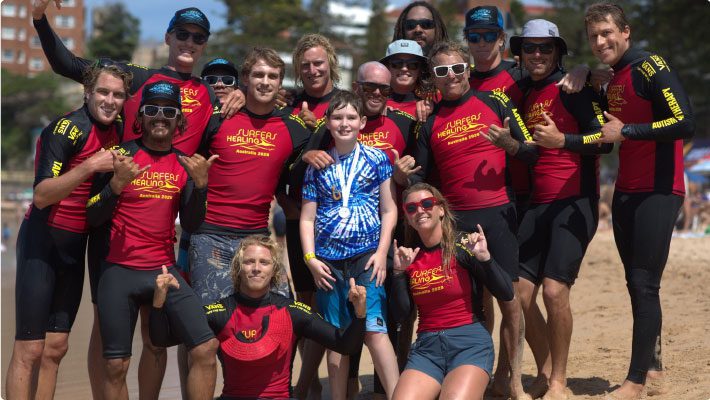 Surfers-Healing-Manly-group-pic-on-beach